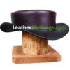 Burgundy leather short top hat with black curved brim and unbanded design