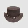 Distressed brown leather top hat with concho harness band and metal ring accents
