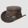 Distressed brown leather top hat with decorative concho band and vintage Western finish