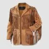 Men's tan cowhide suede fringe jacket with braided trim, geometric shoulder accents, and concho-style sleeve medallions