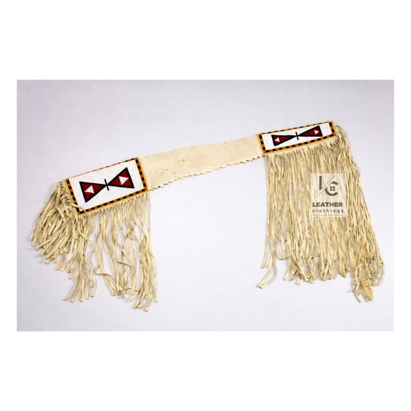 Beige suede fringed rifle cover with triangle beadwork pattern