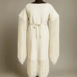 Girls white suede fringe powwow dress with long sleeve fringe and western-inspired leather styling shown from front and back.