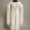 Girls white suede fringe powwow dress with long sleeve fringe and western-inspired leather styling shown from front and back.