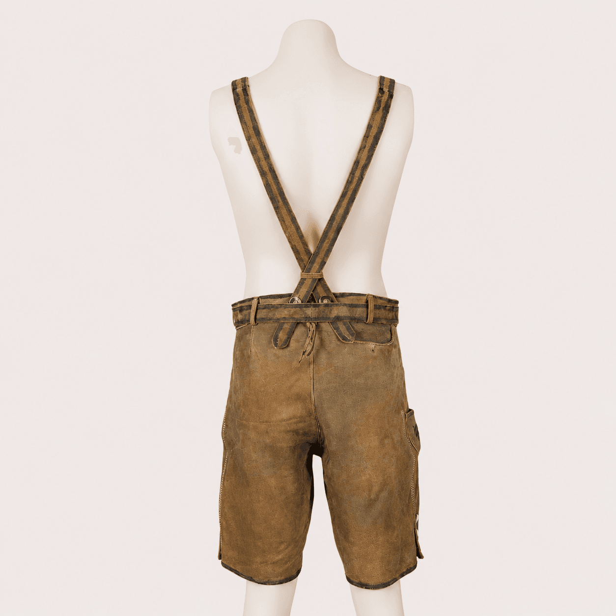 Back view of Men's Lederhosen with Suspenders featuring adjustable crossed suspenders, rear button pocket and lace-up waist.